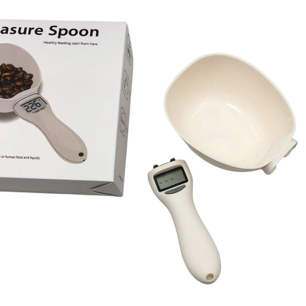 Empaque con foto de cuchara medidora digital y, a la derecha, el utensilio real separado en dos piezas con display visible