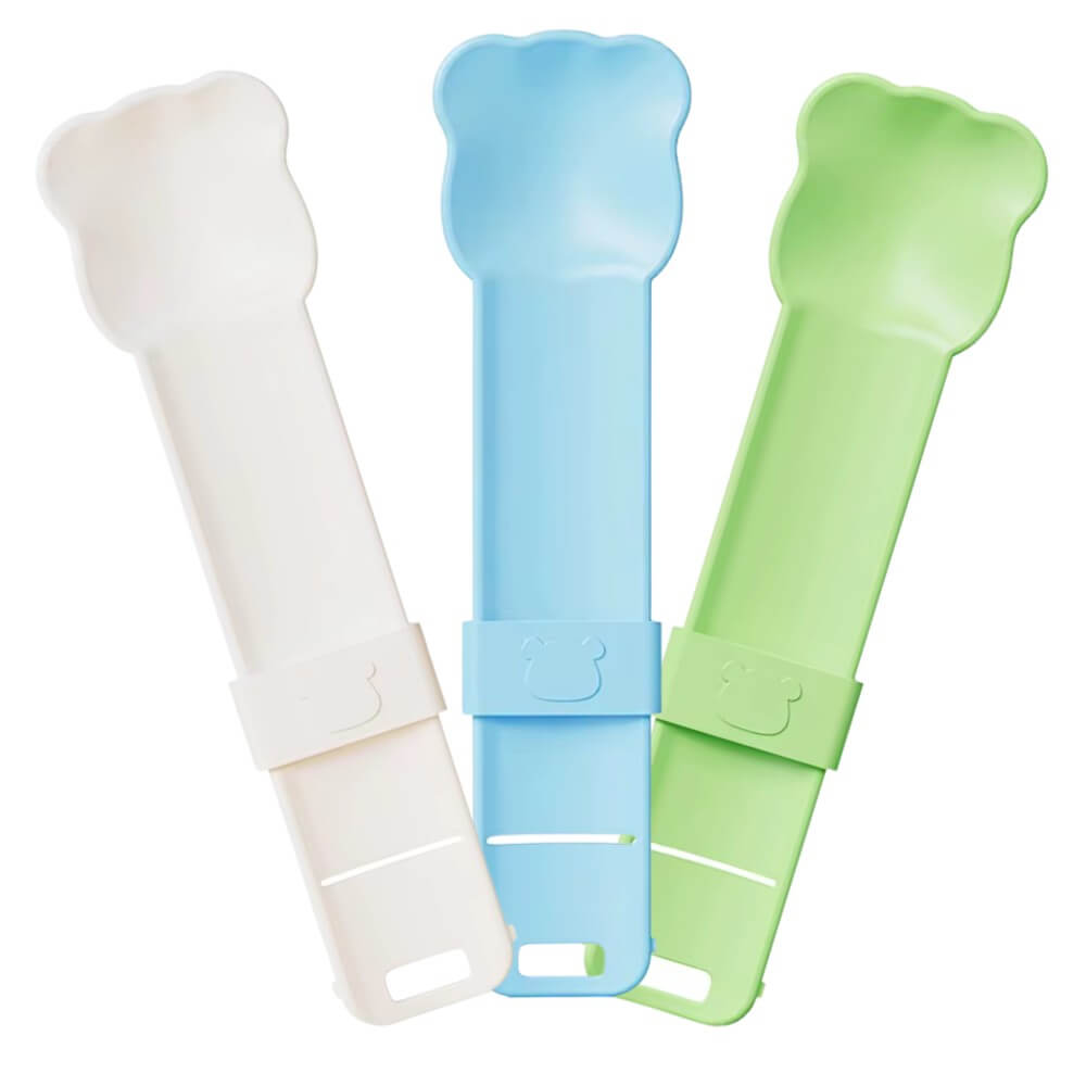 Cucharas exprimidoras de snacks líquidos para gatos colores blanco, azul pastel y verde claro, mostradas en vertical sobre fondo blanco