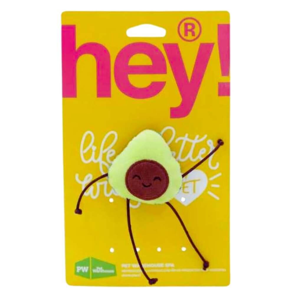 Empaque del juguete de palta para gatos HEY! en cartón amarillo. Peluche plush verde con carita sonriente y patitas bailarinas café