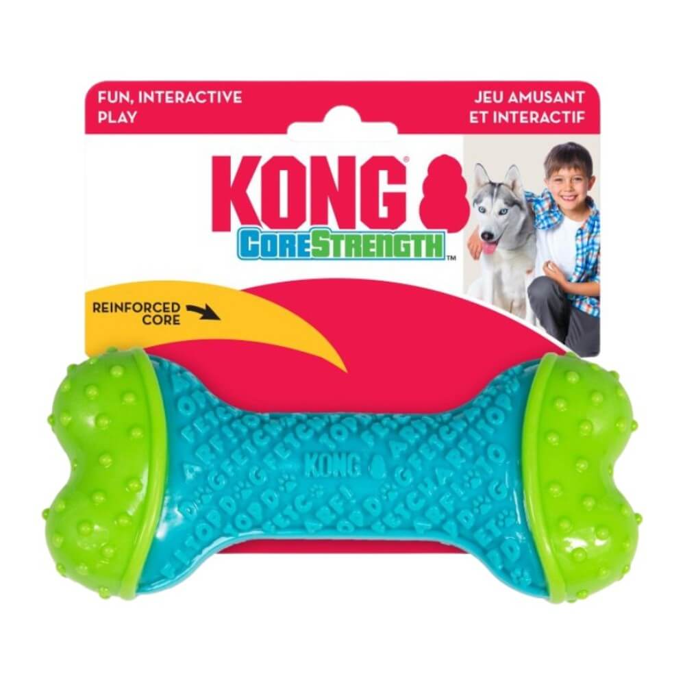 Juguete perro KONG CoreStrength Bone en empaque original rojo y blanco, con imagen de niño con perro husky y texto: Fun, interactive play
