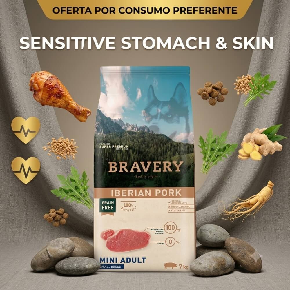 Oferta alimento super premium Bravery Cerdo Ibérico para perros adultos sensibles de raza pequeña sobre un fondo de tela y piedras